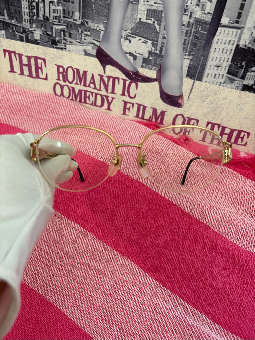 Yves Saint Laurent Gold Round Rimmed Women's Glasses with Black Temple Tips